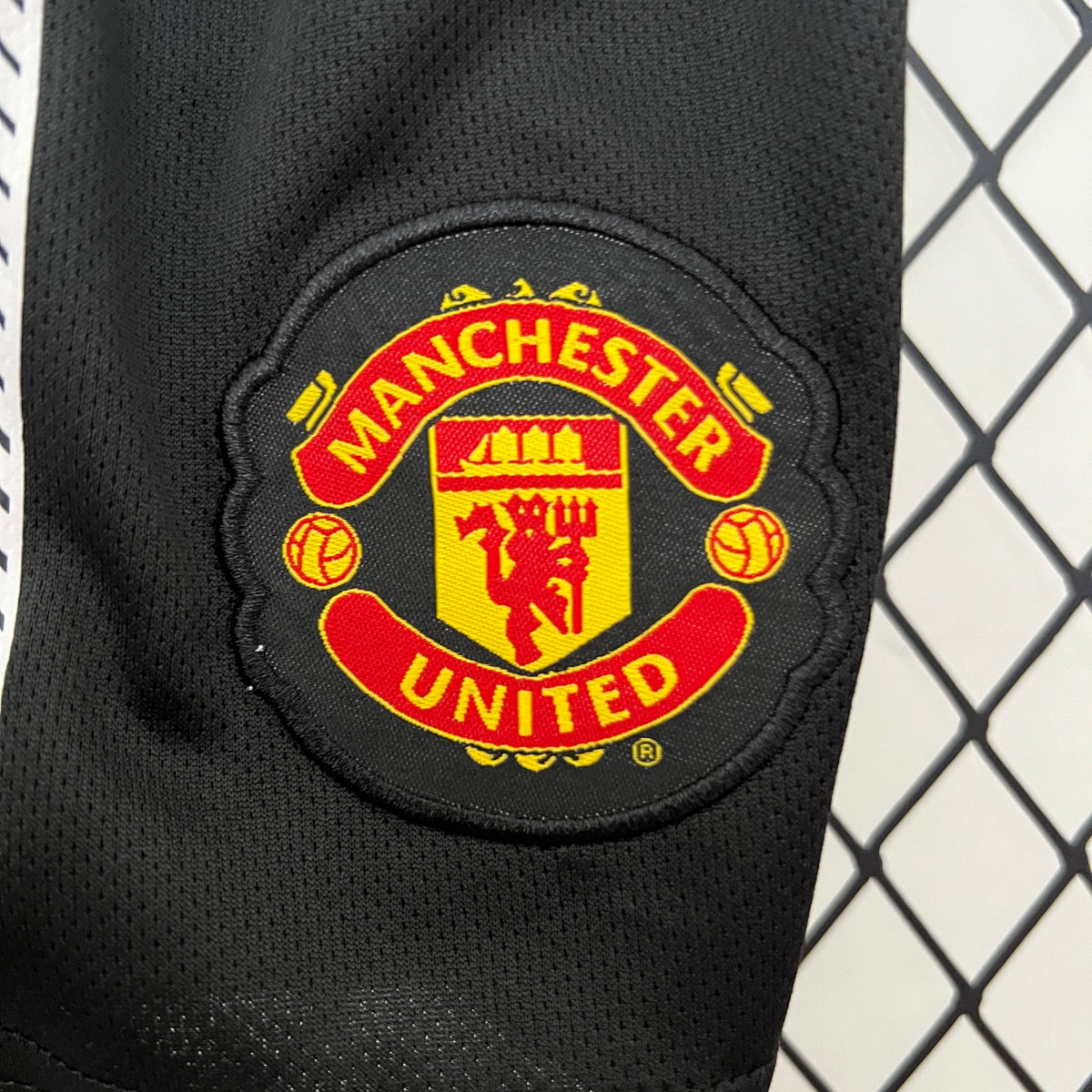 Kit infantil Manchester United RetrƓ Away 2010 - Branca