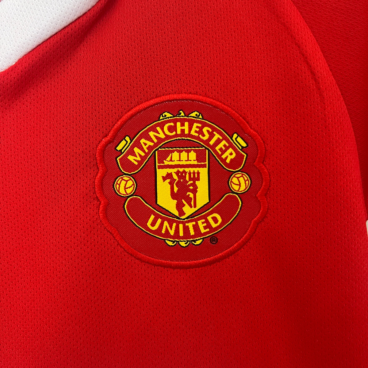 Kit infantil Manchester United RetrƓ Home 2010 - Vermelho