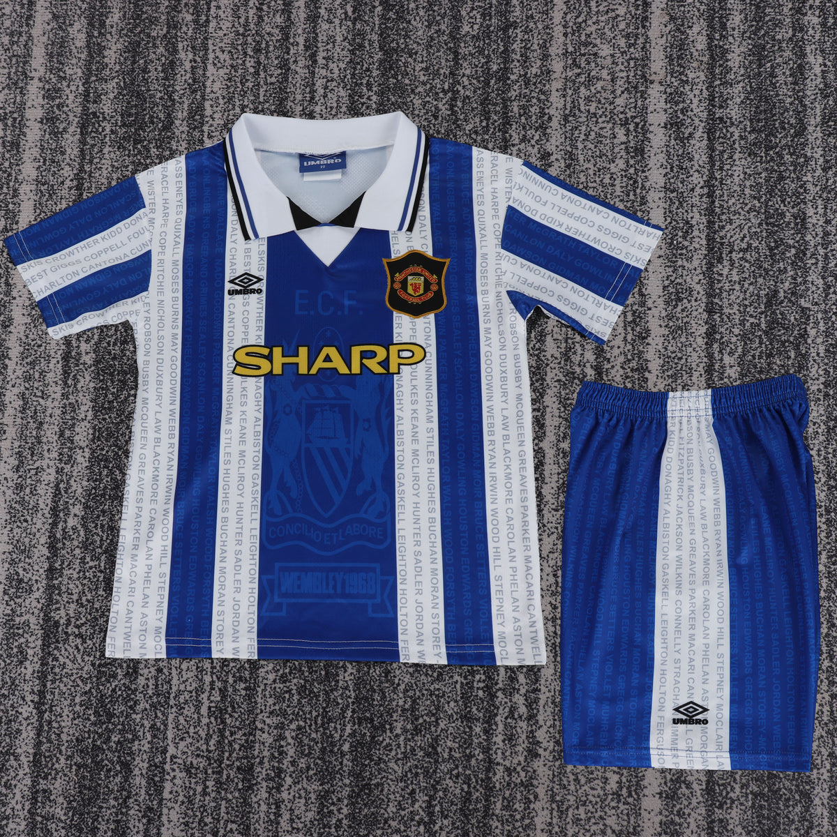 Kit infantil Manchester United Retrô Away 94/95  - Azul e Branco