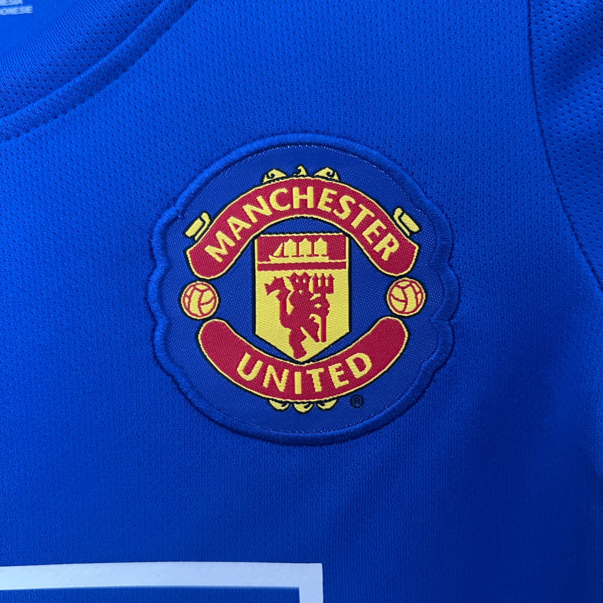 Kit infantil Manchester United Retrô Away 2009 - Azul