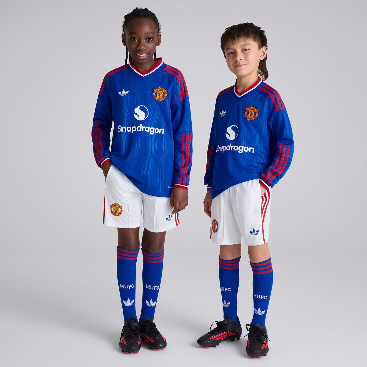Kit infantil Manchester United Away 26/27 Manga Longa  - Azul