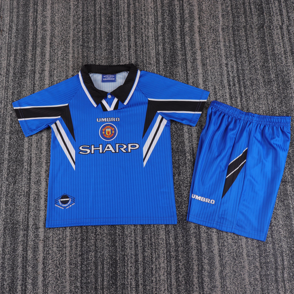 Kit infantil Manchester United Retrô Third 96/97 - Azul