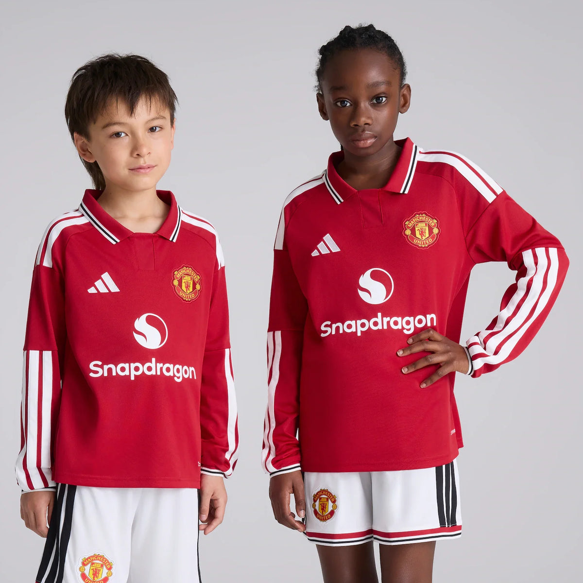 Kit infantil Manchester United Home 26/27 Manga Longa  - Vermelho