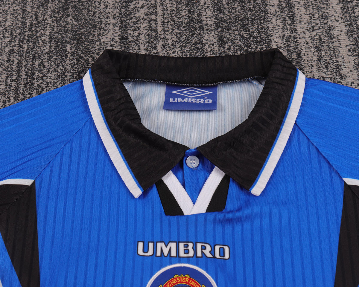 Kit infantil Manchester United Retrô Third 96/97 - Azul