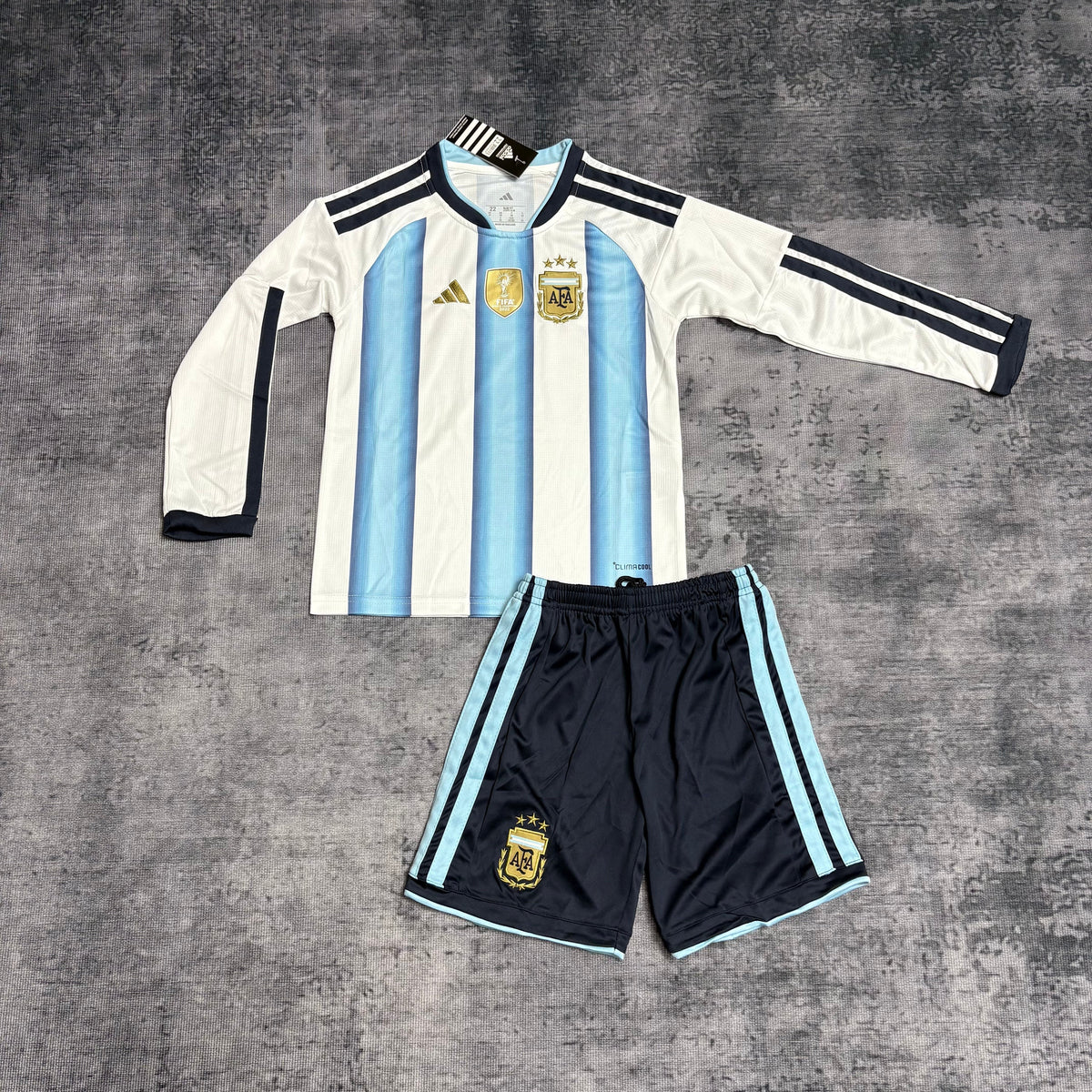 Kit Infantil Argentina Home Manga Longa 26/27 Com Patch Adidas Masculina - Azul e Branca