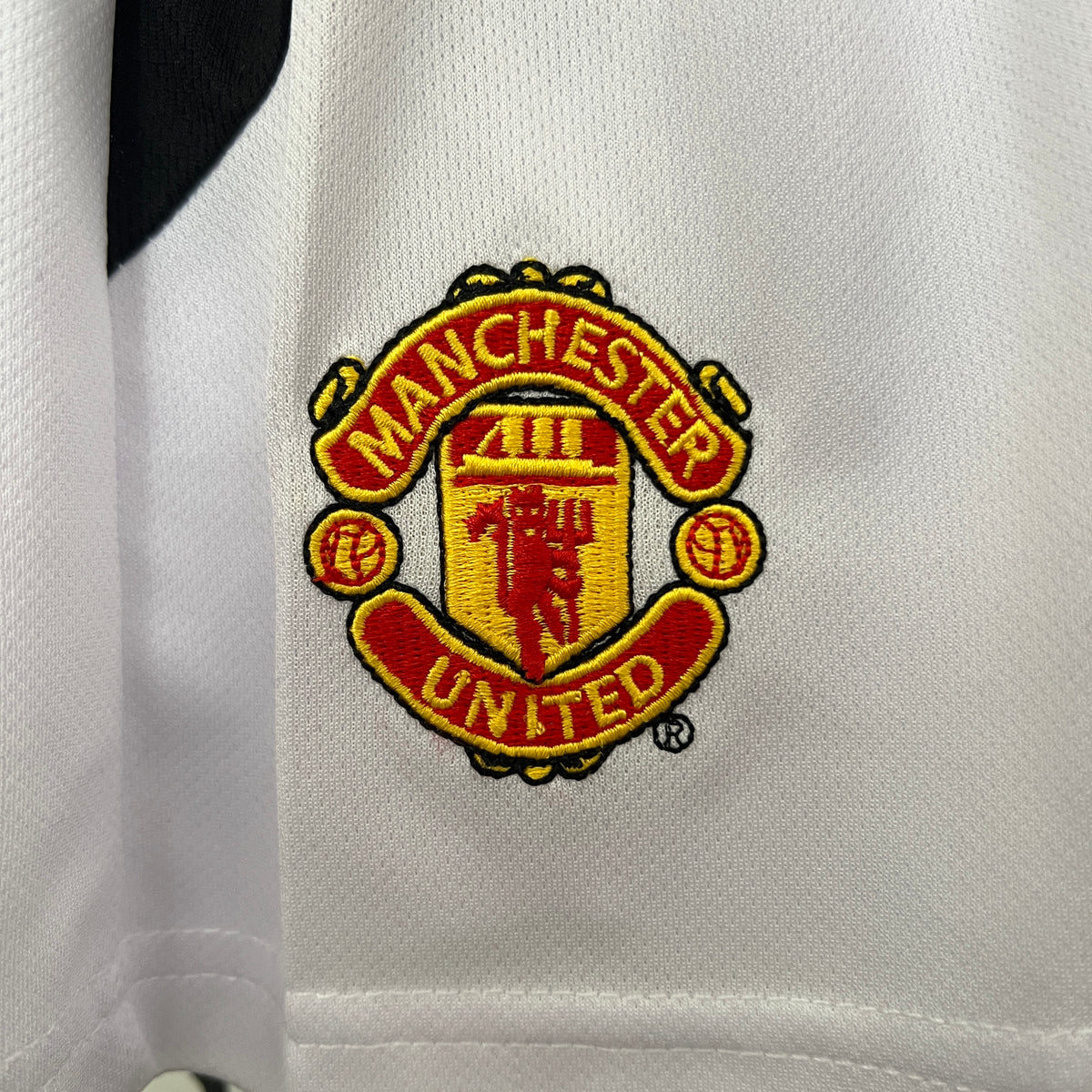 Kit infantil Manchester United Retrô Home 2003  - Vermelho